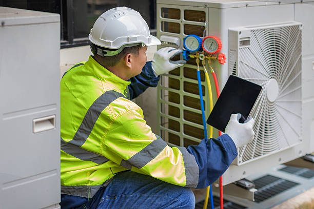 Professional Heat Pump Repair technician working in Wills Point, TX